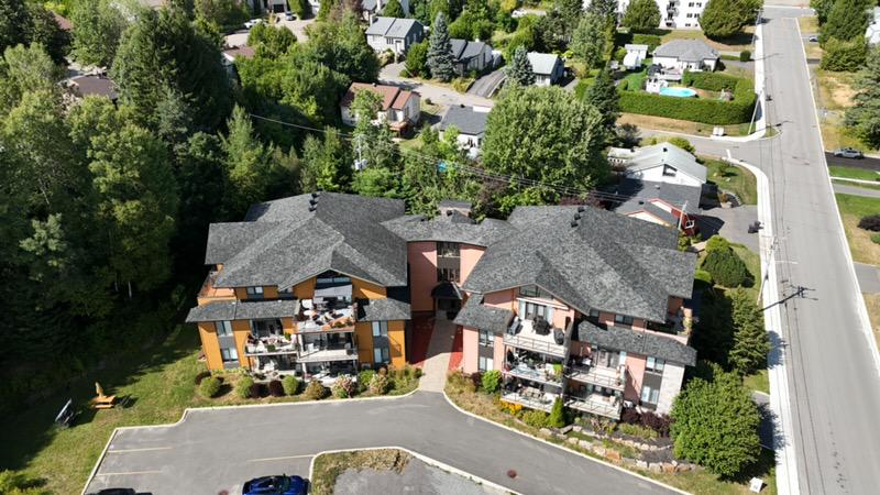 After GoNano NuRoof Revive™ treatment on a multi-family roof