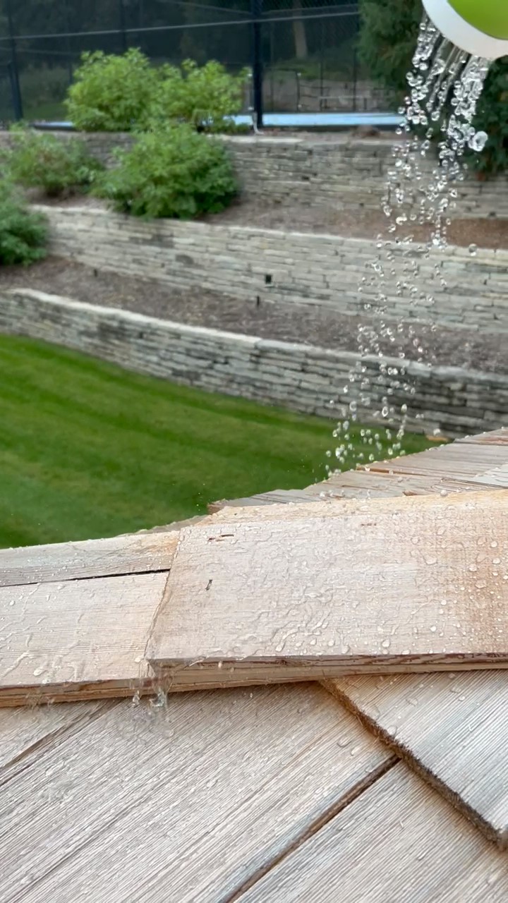 Water draining across a treated wood surface